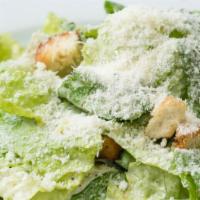 Caesar Salad · Romaine, caesar dressing, shaved parmesan, croutons.