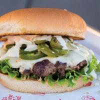Fire Burger · An Angus beef patty with lettuce, onion, serranos, jalapenos, pepper jack cheese, chipotle m...