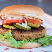 Veggie Burger · A red bean and mushroom patty with lettuce, tomato, onion, pickles, and mayo.