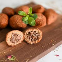Kebbeh Per Piece · Fried ground beef and burghul balls, stuffed with minced beef, onions and pine nuts.