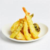 Shrimp Tempura (4Pc) · Shrimp and vegetables fried in tempura batter and served with a tempura dipping sauce.