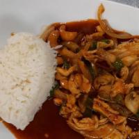 Cashew Chicken · Stir-fried chicken with onions, mushrooms, and cashew nuts in thick brown sauce.