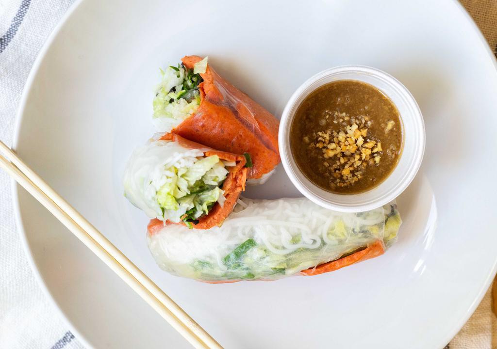 Pork Spring Rolls/Gỏi Cuố Nem Nướng (2 Pcs) · Pork, sliced vegetables, and rice noodles rolled in soft rice paper, served with a peanut dipping sauce.