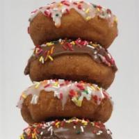 Cake Donuts · White cake. Choose between plain, crumb, powdered sugar, cherry, maple, chocolate, vanilla w...