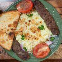 Kubideh Platter · 2 seasoned strips of ground beef served with Basmati rice, grilled tomatoes, chickpeas in to...