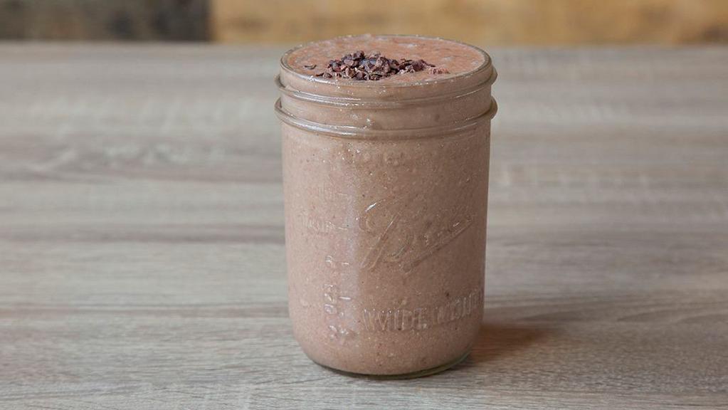Lust · Almond milk, banana, cacao, dates, cashews, maca, a sprinkle of cayenne, and topped with cacao nibs.