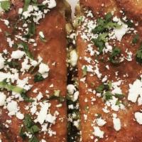 Birria Grilled Cheese · Birria, Monterrey Jack cheese, red onion, and house cilantro sauce, served on cheese crusted...