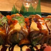 Torched Maki S · Raw. Crabmeat, avocado and tempura crunch inside, topped with torched salmon, spicy mayo, an...