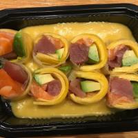 Mango Summer Roll S · No rice,tuna,salmon,avocado,mango,rolled with special rice paper,and mango sauce on top