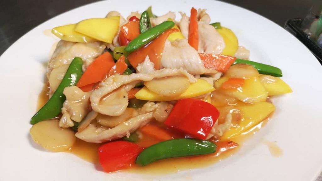 Mango Chicken · Stir fry chicken with mango and vegetables in spicy chilly sauce