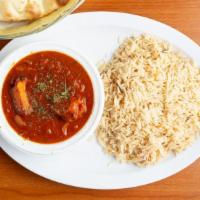 Chicken Tikka Masala · Chunks of white meat chicken barbecued on a grill and folded into a creamy tomato and onion ...