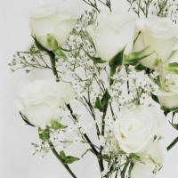 Miniature White Roses And Baby'S Breath Arranged In This Glass Vase · Beautiful miniature white longstem roses with baby's breath arranged in this lovely glass va...