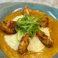 Shrimp & Grits · jumbo shrimp, cajun cream sauce, creamy white cheddar grits