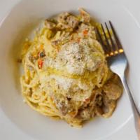 Duck Ragù · Rich and fragrant. The duck is first roasted then braised in its own reduction with a hint o...