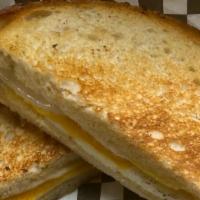 Hydrangea Grilled Cheese · Cheddar and provolone cheeses melted on country white bread.