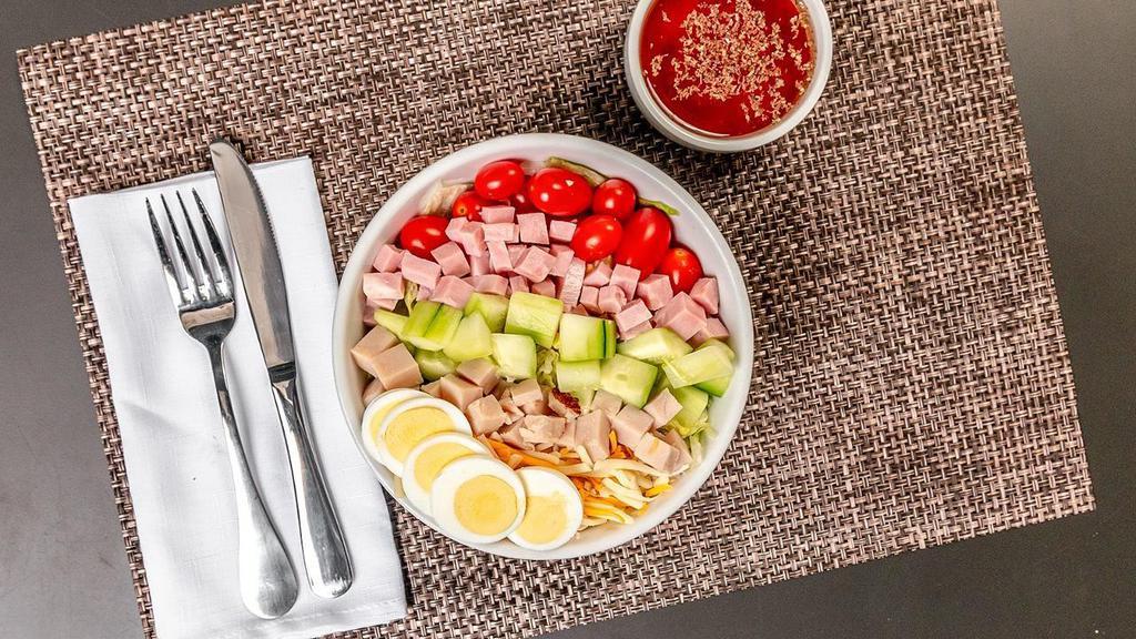 Skinny Italian Salad · Ham, Turkey, Tomatoes, Cucumbers, Cheese, Sliced Egg &Fresh Rocket aka Arugula Mix