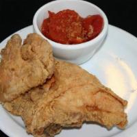 2 Piece White Meat Chicken · Breast and a Wing Served with 2 Sides.