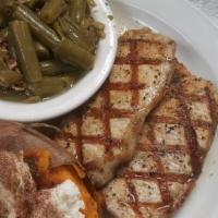 Grilled Pork Chop · Served with 2 Sides.  Add a second piece for only $3.
