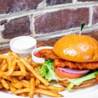 Buffalo Chicken Sandwich · Chicken breast lightly breaded, fried and dipped in a hot or mild buffalo sauce topped with ...