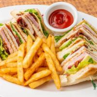 Cosmos Club · Triple decker club sandwich with ham, turkey, bacon, American cheese, lettuce, tomato and ma...