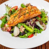 Grilled Salmon Salad · Field greens, asparagus, tomatoes, walnuts, dried cranberries with a side of honey dijon dre...