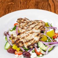 Opa Opa Greek Salad · Mixed greens topped with grilled chicken breast, feta cheese, kalamata olives, onions, cucum...
