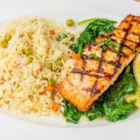 Broiled Atlantic Salmon · With honey mustard glaze or lemon butter sauce on a bed of spinach with a side of rice. Serv...
