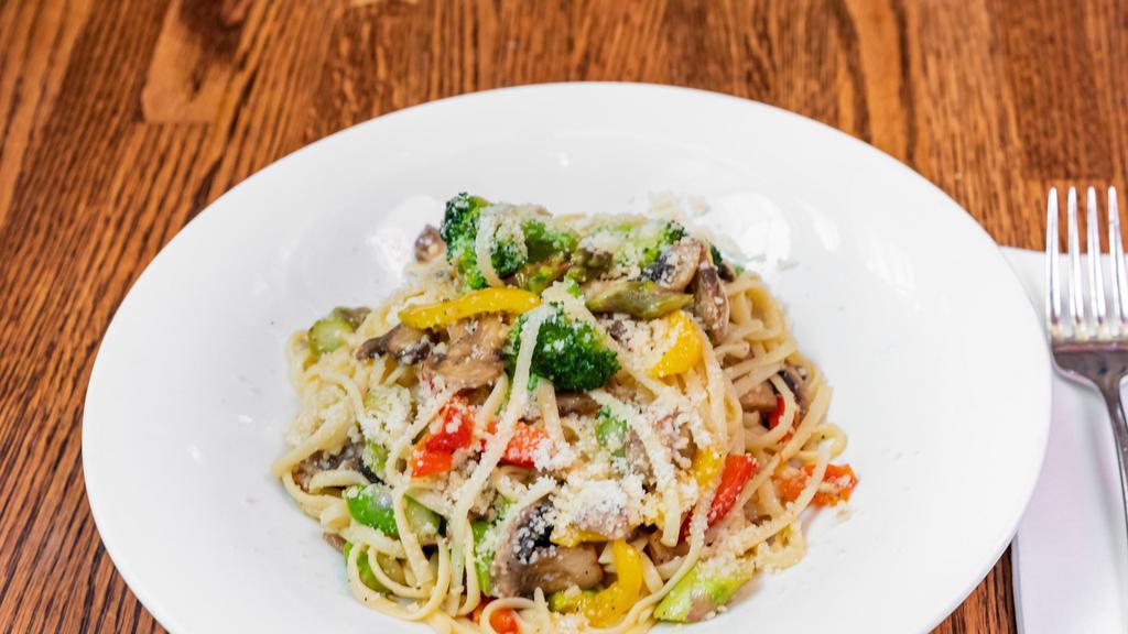 Garden Pasta · Mushrooms, red and yellow peppers, asparagus, zucchini in a light olive oil, Parmesan cheese, garlic sauce over penne. Served with a Garden Salad.