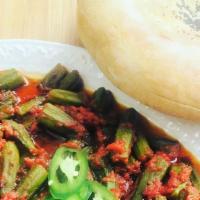 Bendi · Stewed okra with fresh tomato and afghan seasoning.