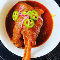 Lamb Shank · New Zealand grass fed and range free lamb Shank slow cooked in tomatoes, herbs and Afghan se...