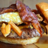 Freshman 15 · Smashed fries, melted cheddar cheese, fried egg, bacon