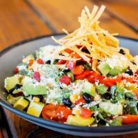 South Of The Border · Chopped romaine w/corn, black beans, jalapeños, red bell peppers, 1/2 an avocado, cherry tom...