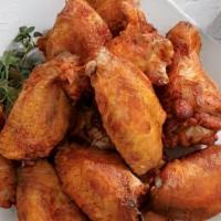 Chicken Wings · wings tossed In a choice of plain, buffalo, BBQ, Teriyaki, Korean BBQ, Garlic Parmesan, Nash...