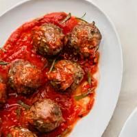 Meatballs · with pork and beef served in Tomato sauce