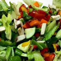 Garden Salad · iceberg, tomatoes, carrots, cucumbers shaved carrots