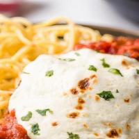 Veal Parm With Pasta · Veal breaded, fried, and baked with tomato sauce and mozzarella cheese