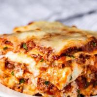 Meat Lasagna · Fresh pasta sheets, ricotta, mozzarella, romano cheese, and meat sauce.