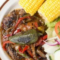 Carne Asada · Grilled steak with sautéed pepper and onions on top served with one grilled jalapeno and cho...