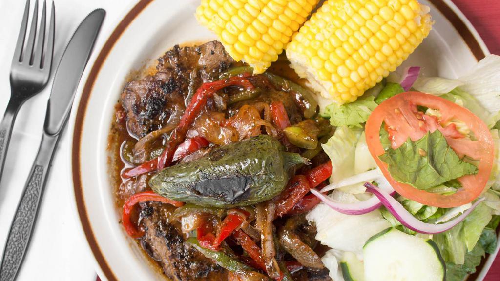 Carne Asada · Grilled steak with sautéed pepper and onions on top served with one grilled jalapeno and choice of two sides.