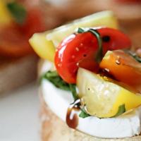 Mozzarella Caprese · Sliced fresh mozzarella with sliced tomatoes, basil, extra virgin olive oil, and balsamic gl...