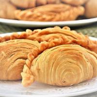 Curry Puff · Deep fried puff pastry filled with minced chicken, potato and onion in mild curry, served wi...