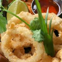 Fried Calamari/Spicy Calamari · Fried calamari - battered fried calamari. Spicy calamari - battered fried calamari sauteed w...
