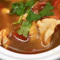 Tom Yum · Hot and sour soup with lemongrass, galangal mushroom scallion and cilantro. * 
 
*Mild spicy!
