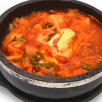 Kimchi Jjigae / 김치찌개 · Spicy kimchi soup with house special kimchi and tofu.