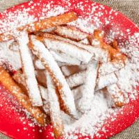 Funnel Cake Fries · A delicious funnel cake batter, doused in powdered sugar, and served in a convenient stick s...