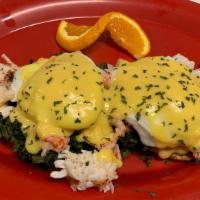 Lobster Eggs Benedict · Sauteed real lobster and spinach atop an English muffin, topped with poached eggs and hollan...