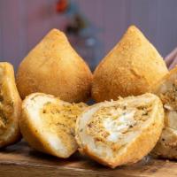 Traditional Coxinha · This is our take on the traditional-sized Coxinha. Deliciously filled with seasoned shredded...