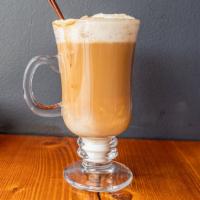 Cappuccino · An espresso coffee drink prepared with steamed milk foam, topped with whipped cream and cinn...
