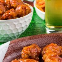 Boneless Cajun Wings · Deep-fried chicken wings tossed in our sweet paprika cajun rub. Comes with your choice of di...