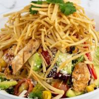 Southwest Smoked Chicken Salad · Mesquite smoked chicken, roasted sweet corn, red peppers, avocado, cherry tomatoes, marinate...